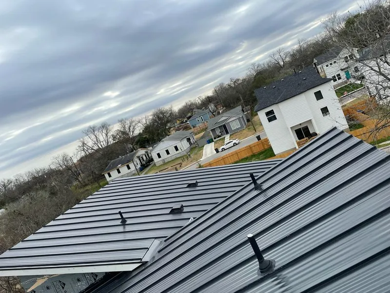Standing seam metal roof panels with vents for Skylight Repair in New Baltimore